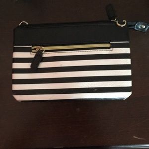 Black and white purse designed by Emma Scarce